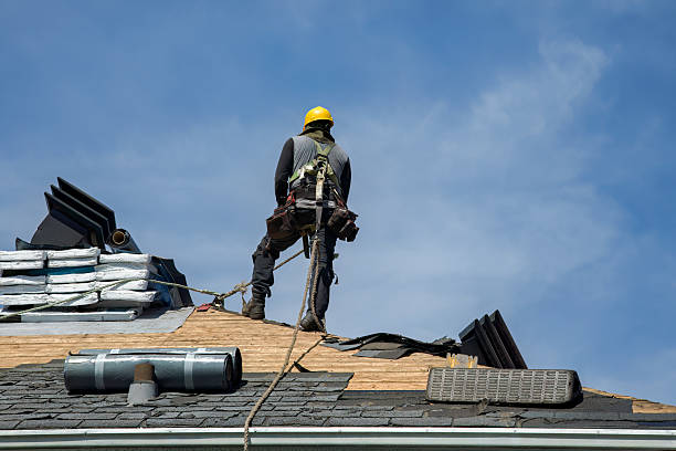 Professional Roof Replacement technician working in Marsteller, PA